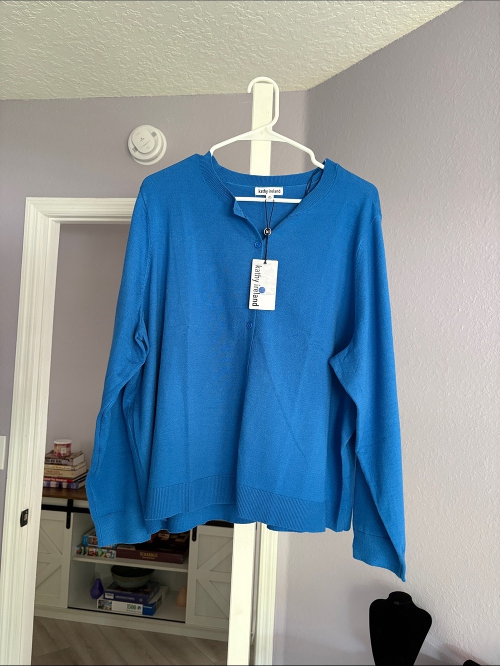 kathy ireland Woman’s cardigan.